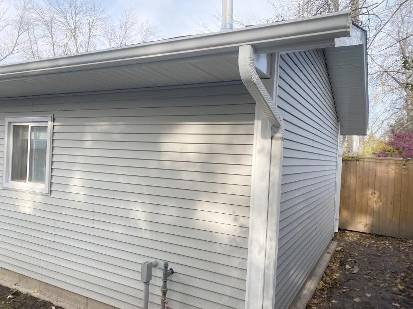Corner of a home with siding and soffit detail.